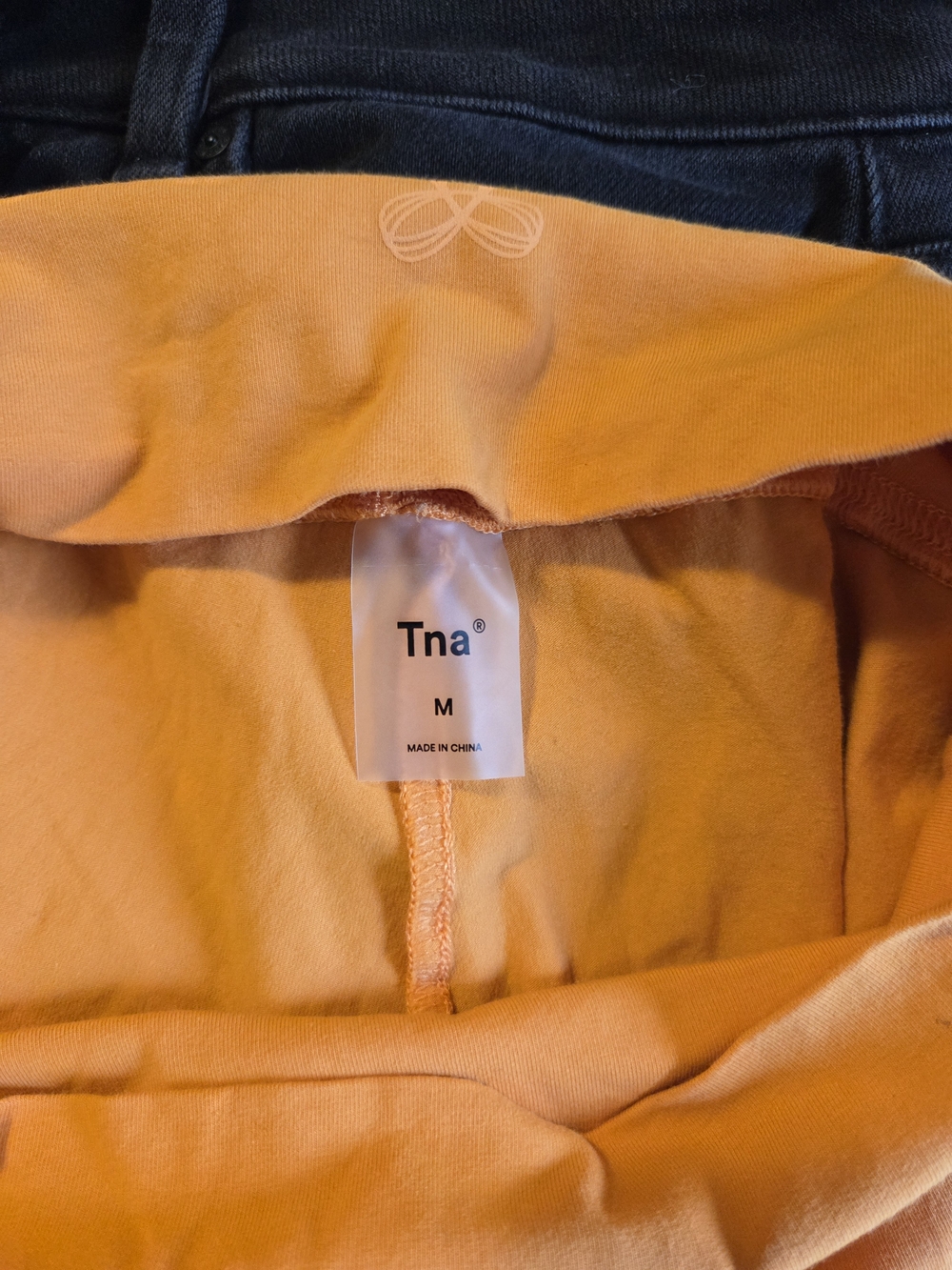 TNA Flared Leggings in Mustard Orange - Picture 4 of 5